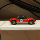 Lesney Edition from 2011. A beautiful racing livery version with tampos all around! The roof/window piece is black though, so you can’t see through the windshield.